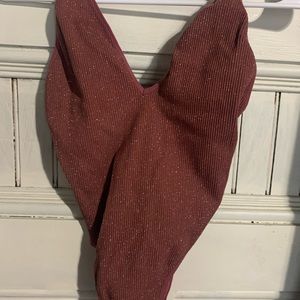 Size small burgundy-sparkly body suit, no tags